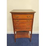 Edwardian inlaid mahogany music cabinet with four fall front drawers above undertier. Decorated