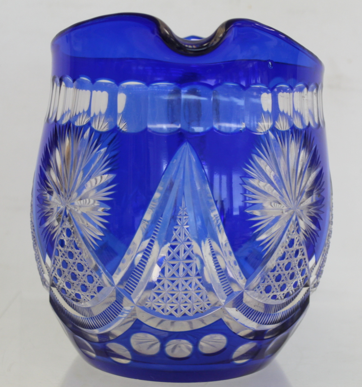 Bohemian blue flashed cut glass water jug of helmet form, 19.5cm high; a pearlescent clear glass - Image 3 of 10