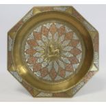 Indo-Persian octagonal brass tray or shallow dish, with central medallion of a lion with sword in