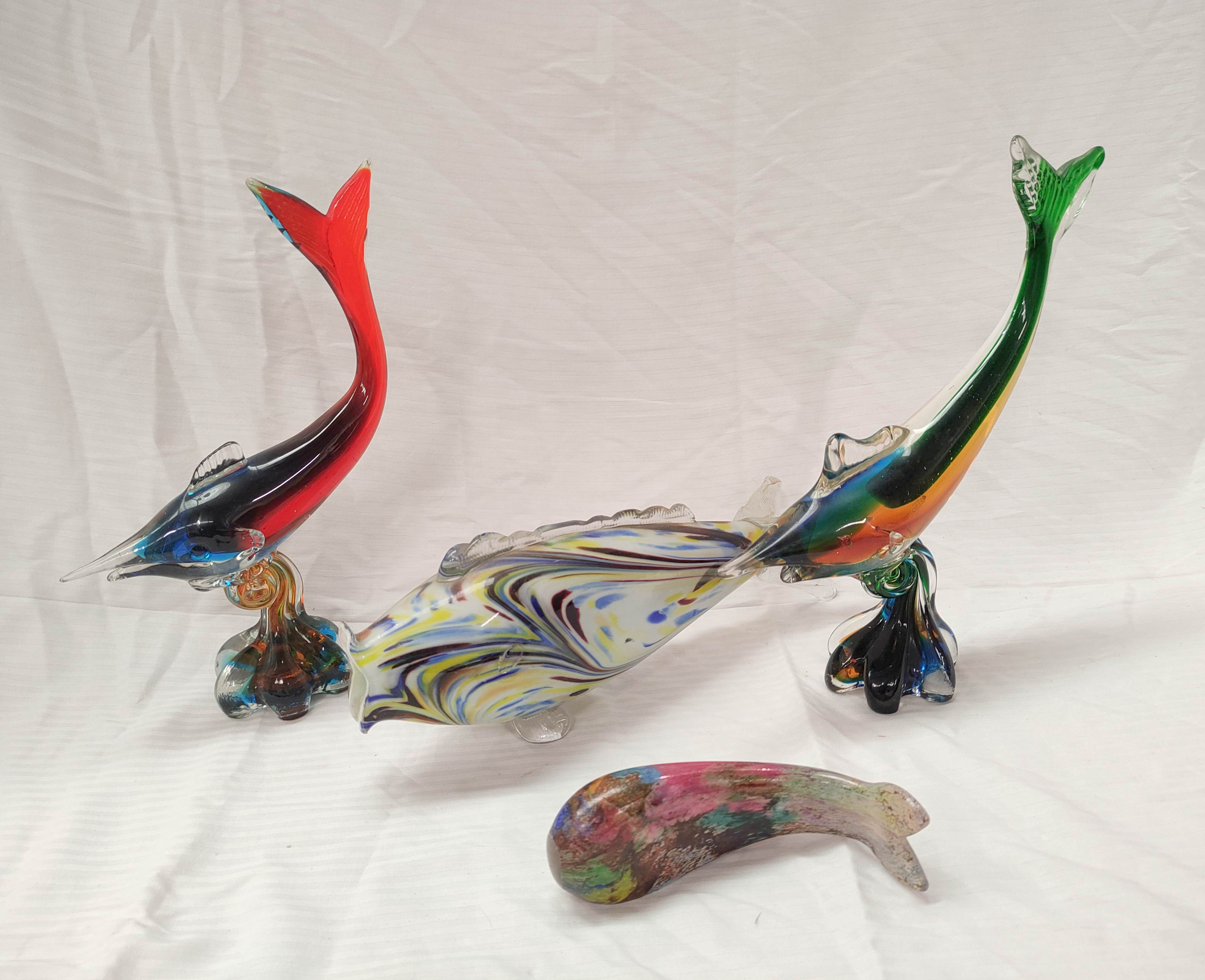 Two mid 20th century Continental art glass figures of fish on lobed scroll bases, 31cm and 30cm