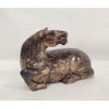 Large Chinese mottled grey and brown hardstone carving of a recumbent horse, 14cm high, 19cm long.