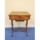 19th century burr walnut sewing table with hinged serpentine top enclosing a maple interior with a