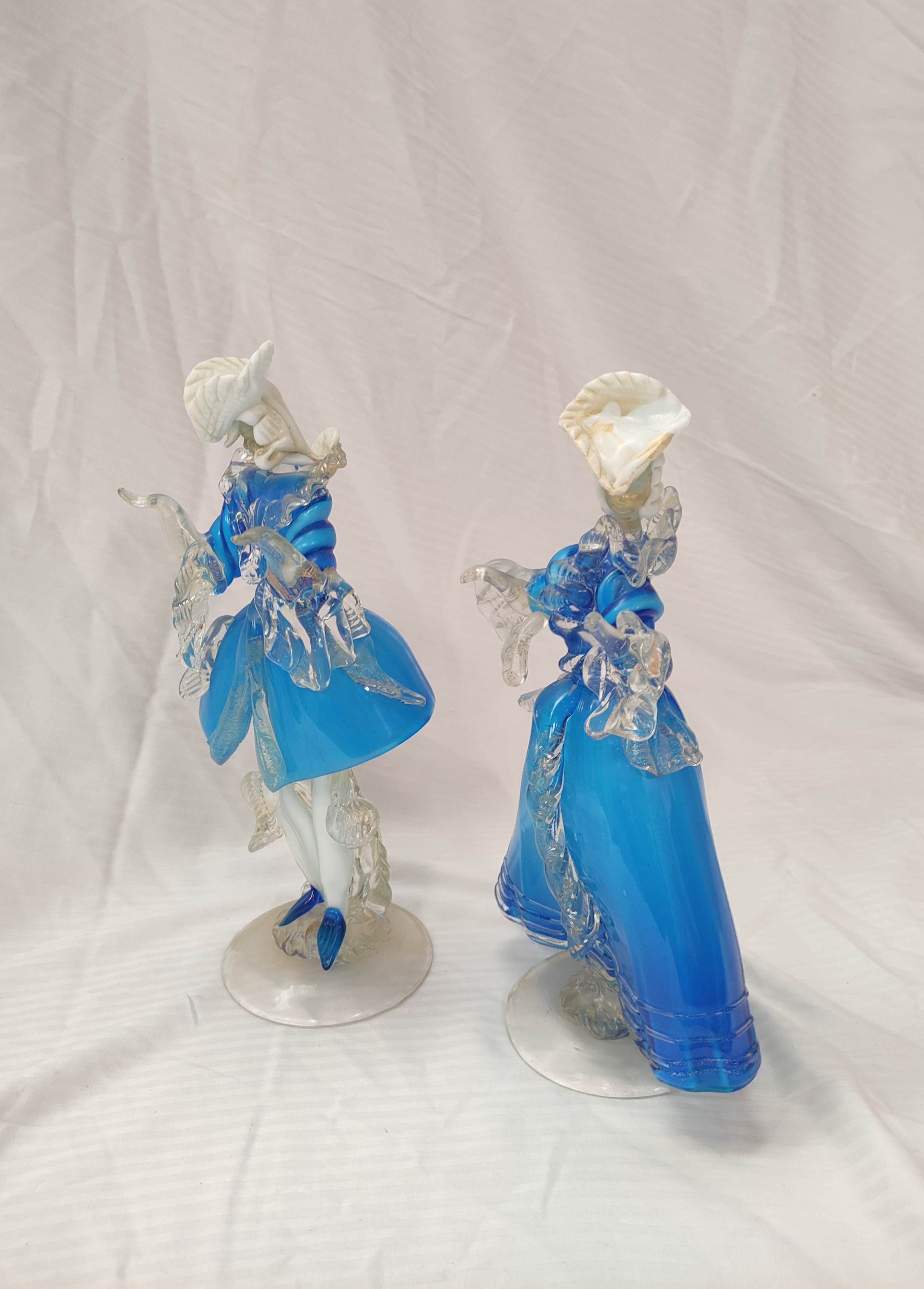 Pair of mid 20th century Venetian blue, white and clear glass figures of a lady and gentleman in