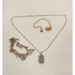 Silver vinaigrette, Birmingham 1858, on necklet, a locket and sundry silver items.