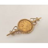 Half sovereign 1909, 9ct gold detachable brooch mount, 6.8g.