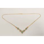 Gold necklace with oval emeralds and diamonds, 10kt', 6.1g gross.