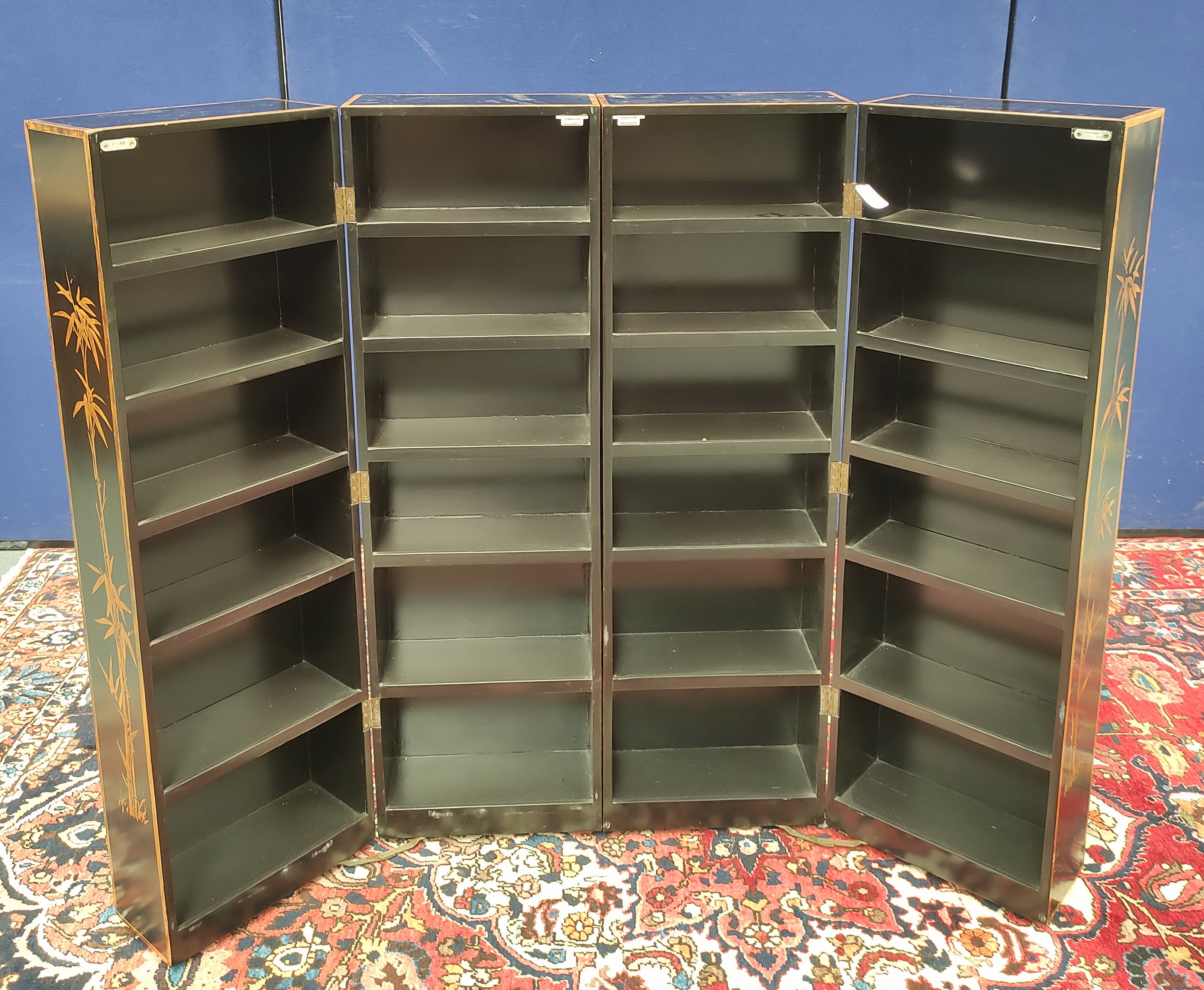 Chinese black lacquer and gilt screen divider in four sections with open shelving decorated with - Image 2 of 2