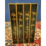 Chinese black lacquer and gilt screen divider in four sections with open shelving decorated with