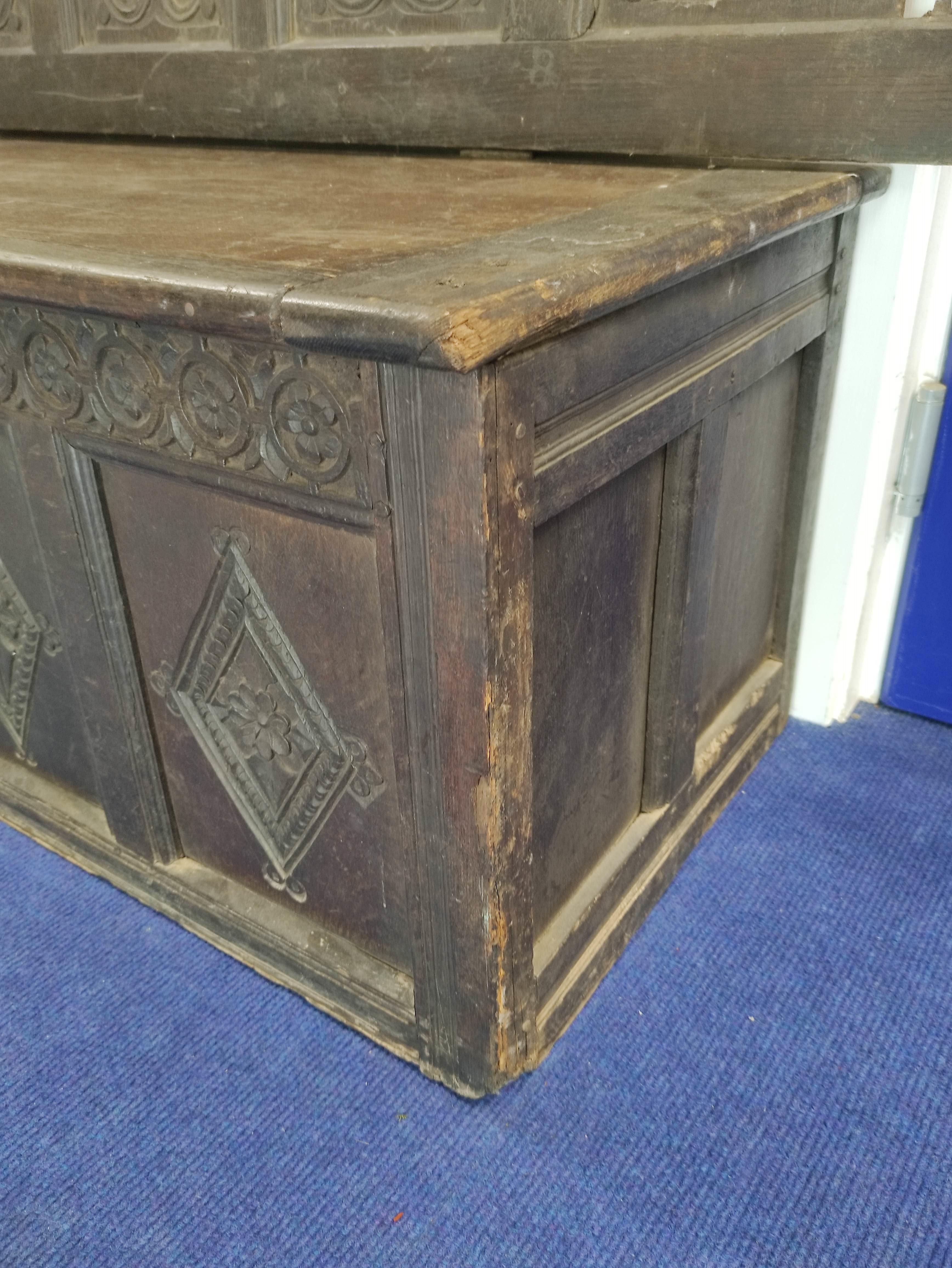 Charles I period carved oak hall bench, inscribed IMR and carved with floral panels and swags to the - Image 4 of 4