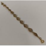 Gold filigree bracelet with lozenge shaped links, probably 15ct, 9g.