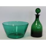 Victorian green glass decanter of plain blown form with globular stopper, polished pontil, 27cm