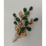 Gold and nephrite spray brooch, '14k', 9.7g gross.