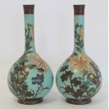 Pair of Japanese Meiji period cloisonné bottle vases, the turquoise ground with polychrome enamel