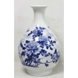 20th century Chinese large blue and white vase of baluster form decorated with peonies, with