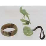 Three pieces of modern Chinese jade, comprising: small carved figure of a phoenix on a branch, 9.5cm