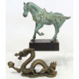 20th century Tang style metal figure of a horse with verdigris patina, on rectangular mahogany