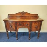 19th century mahogany sideboard in the manner of Gillows, with a scroll decorated pediment above a