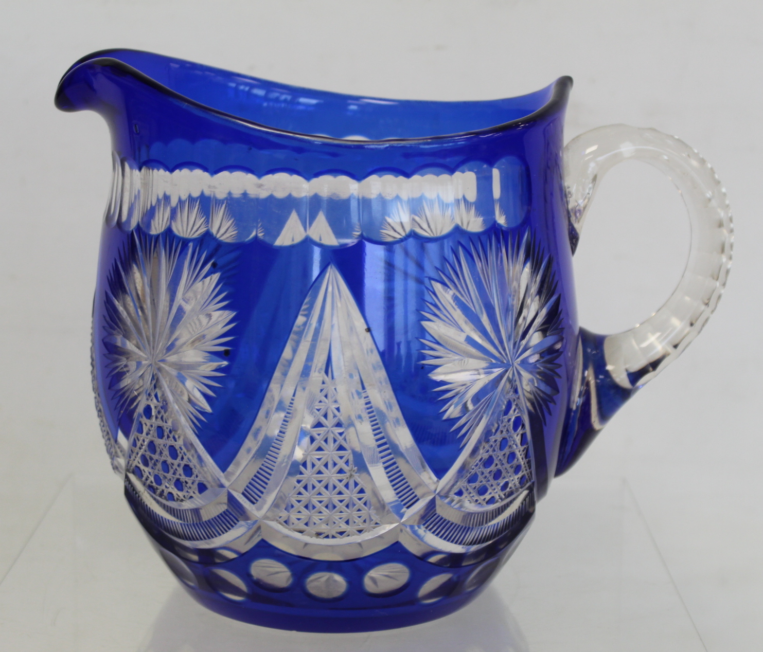 Bohemian blue flashed cut glass water jug of helmet form, 19.5cm high; a pearlescent clear glass - Image 2 of 10
