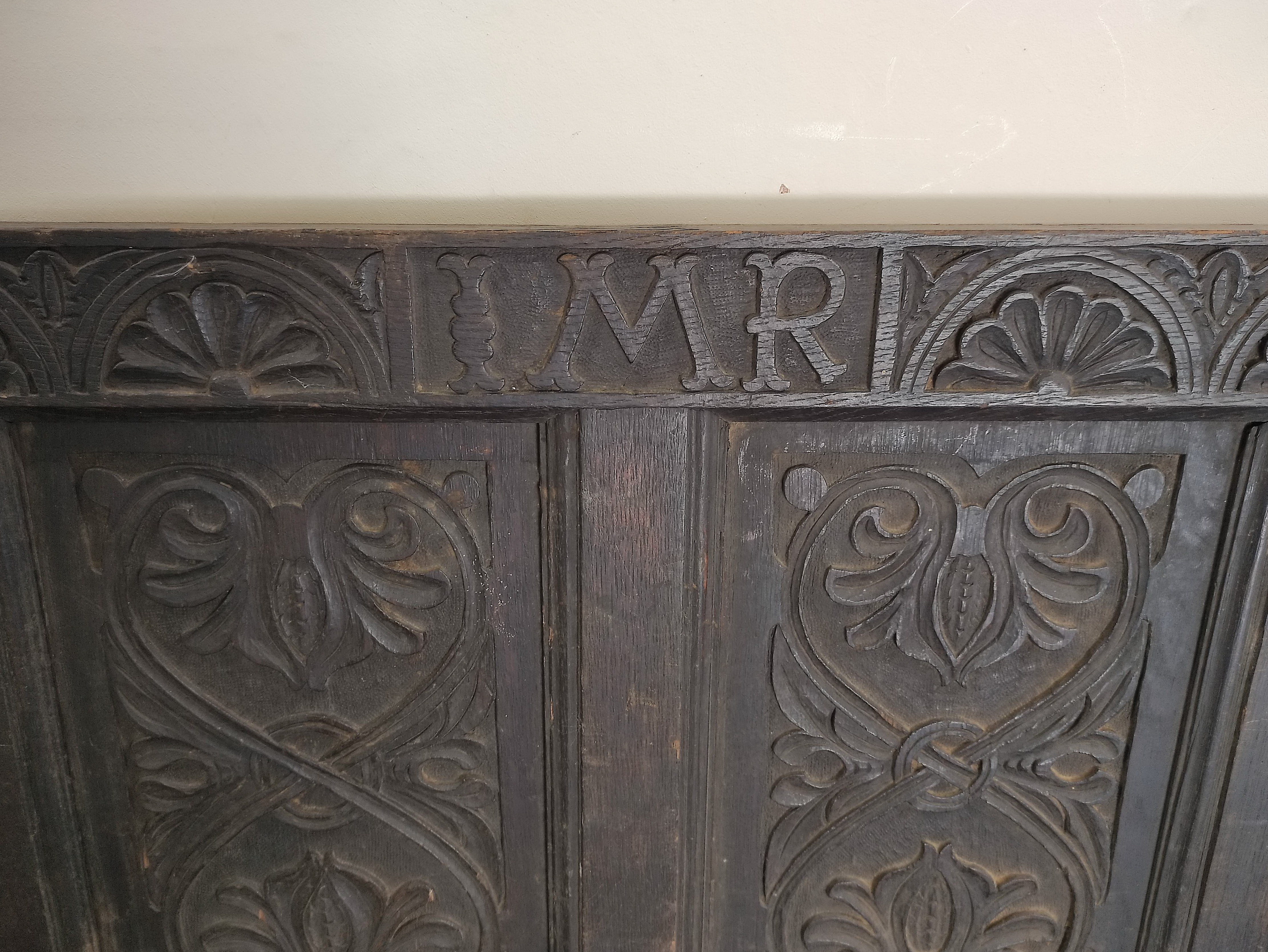 Charles I period carved oak hall bench, inscribed IMR and carved with floral panels and swags to the - Image 2 of 4