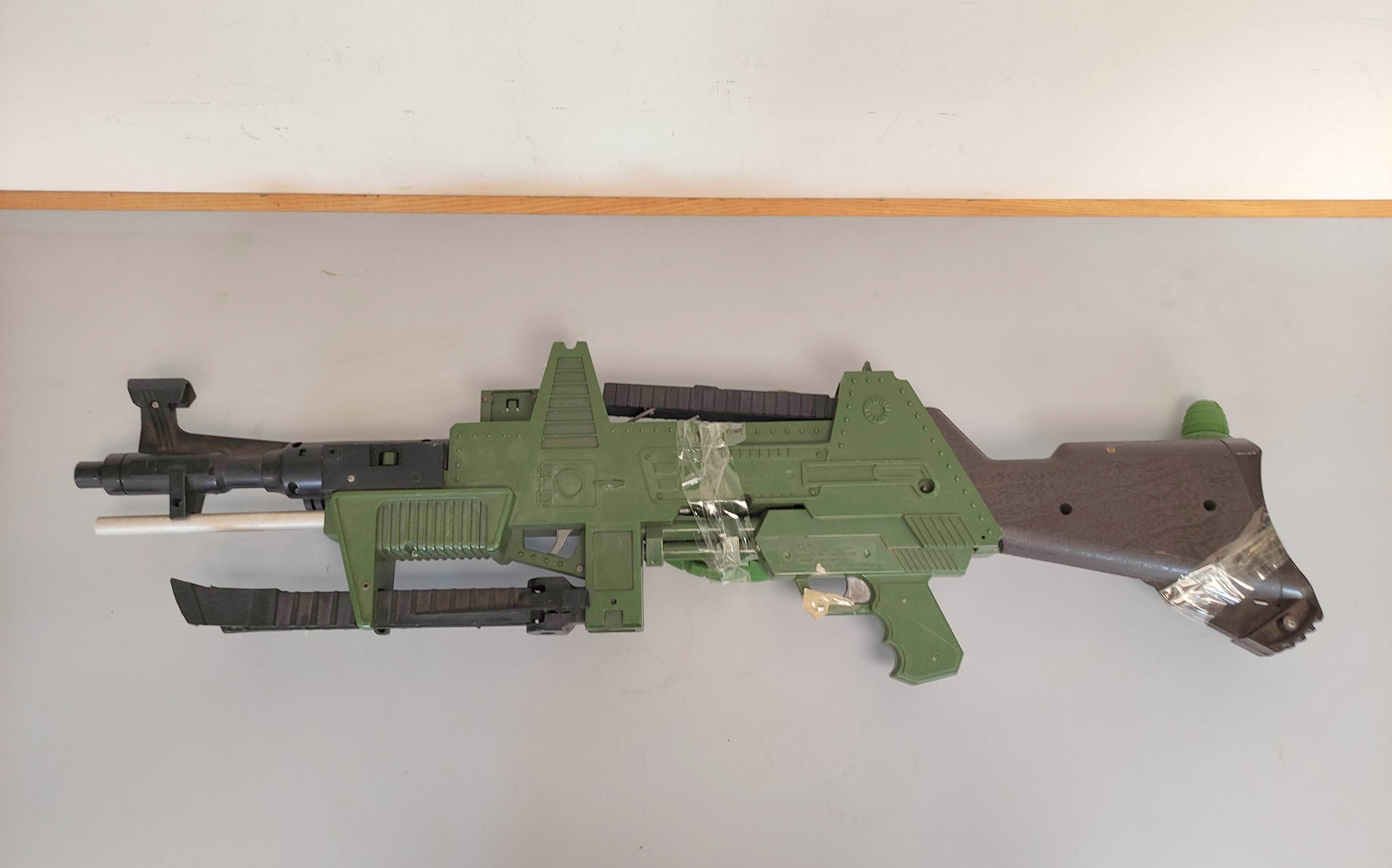 Topper Toys- Johnny Seven O.M.A One Man Army combat rifle of green plastic construction with bi- - Image 5 of 6