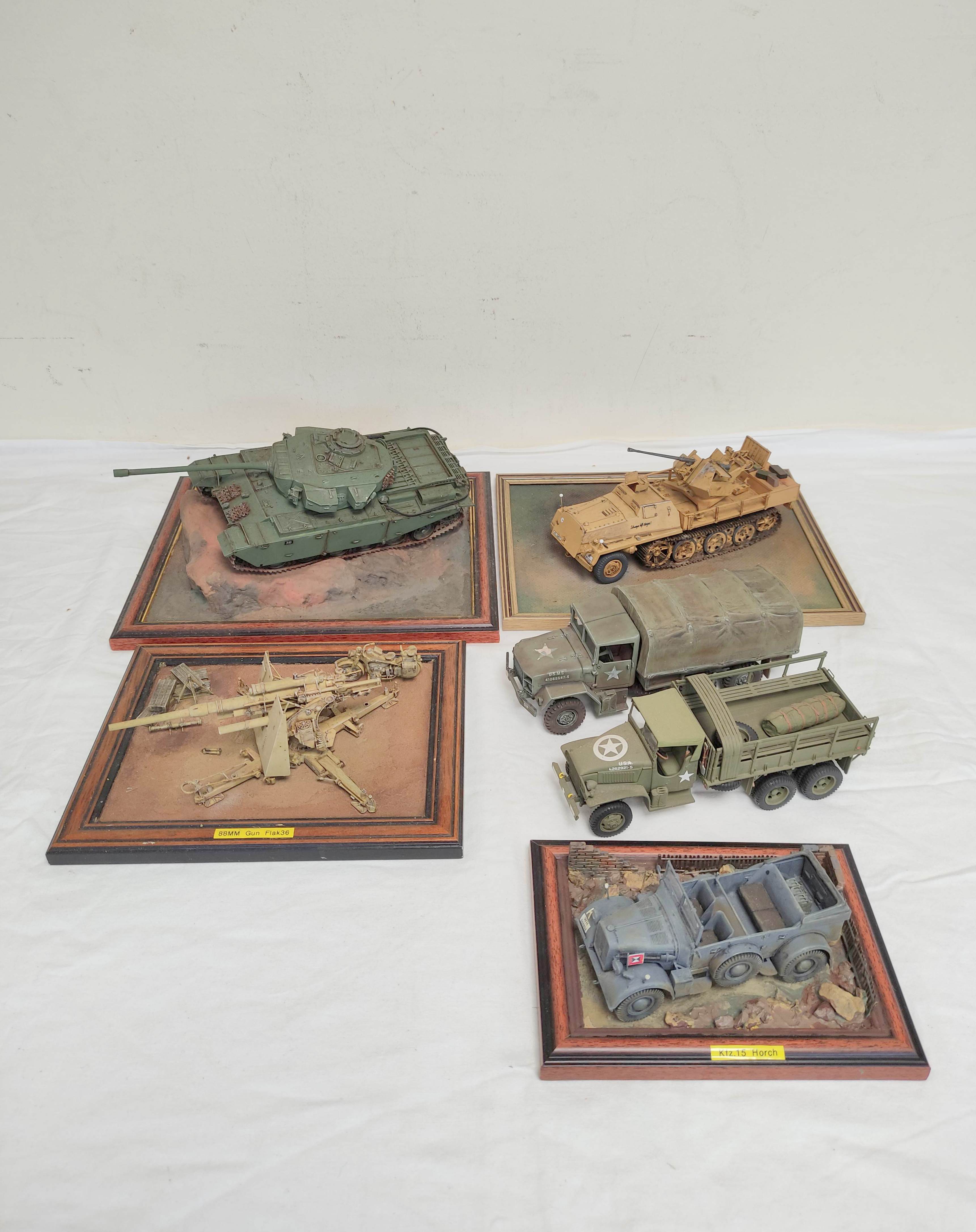 Six collector's model military vehicles. To include a German 88mm Flak 36, German KFZ.15 Horch,