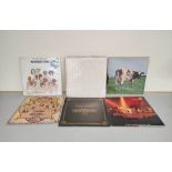 Eighteen classic rock Lps to include Pink Floyd Atom Heart Mother SHVL 781 first pressing, Lynyrd