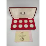 United Kingdom. 1977 silver jubilee Spink's silver crown eight coin set. Complete with box and