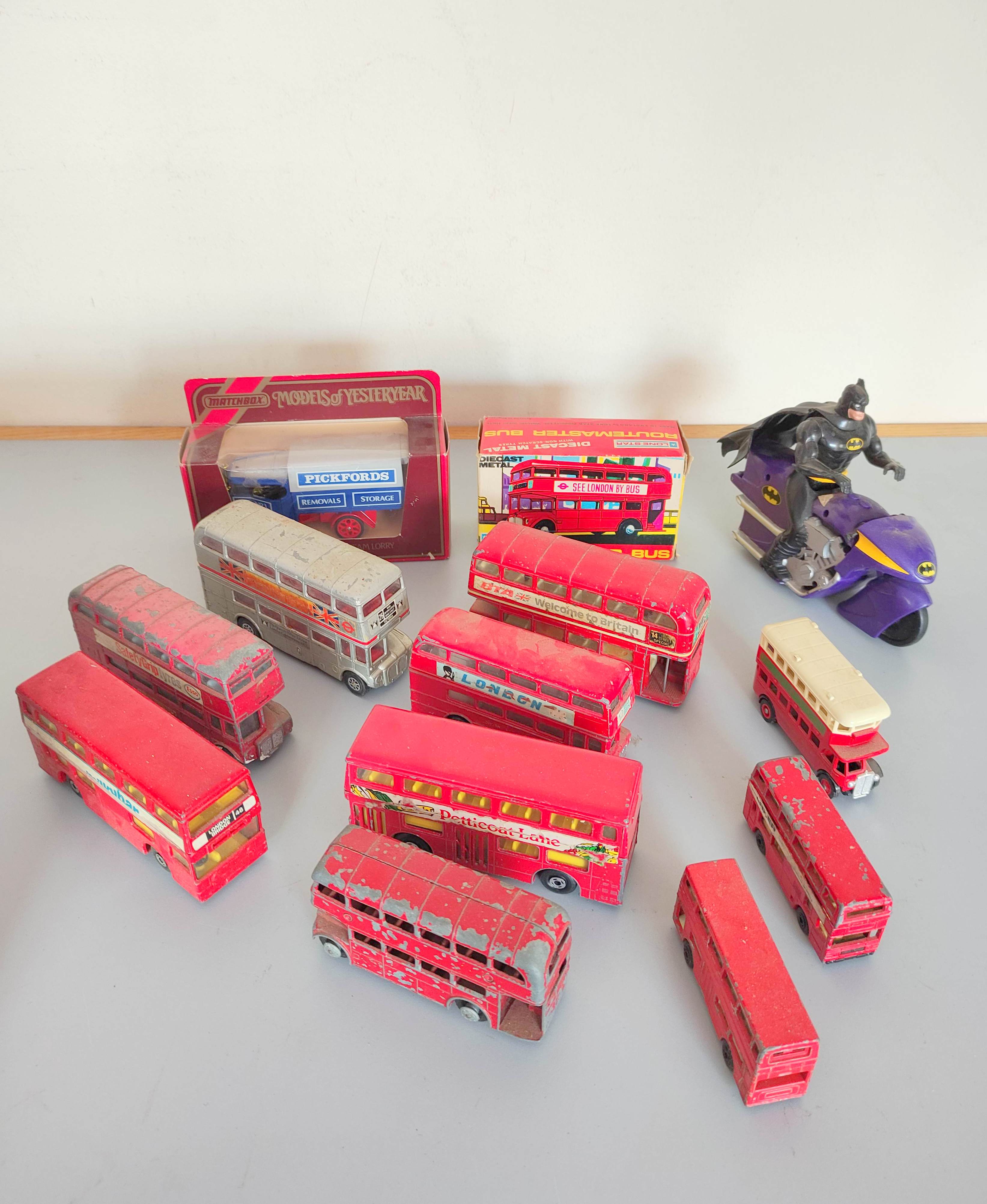 Quantity of loose and boxed vintage model vehicles to include eleven die cast Routemaster model