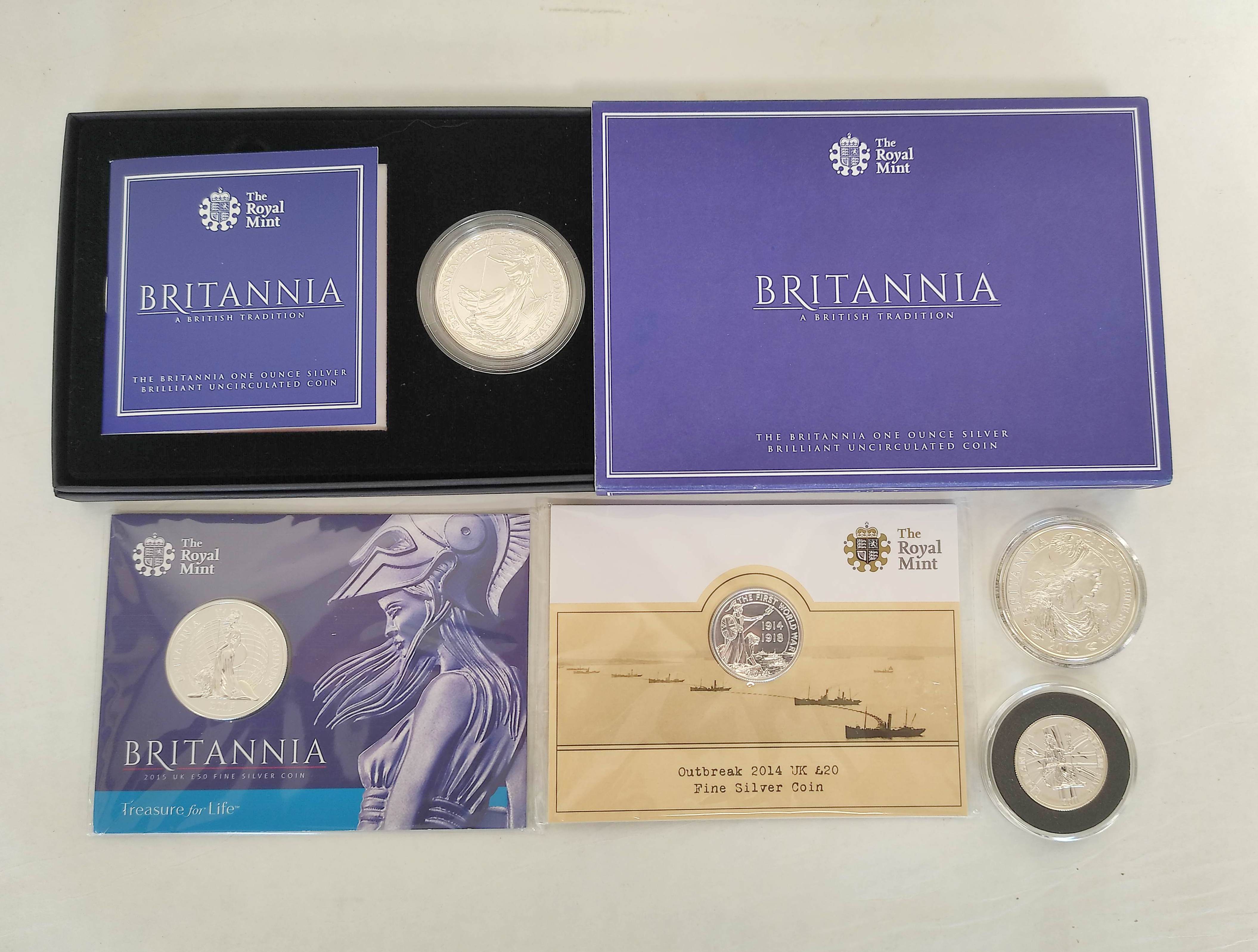 Great Britain- Silver bullion coins to include three 1oz silver Britannias, one boxed and with