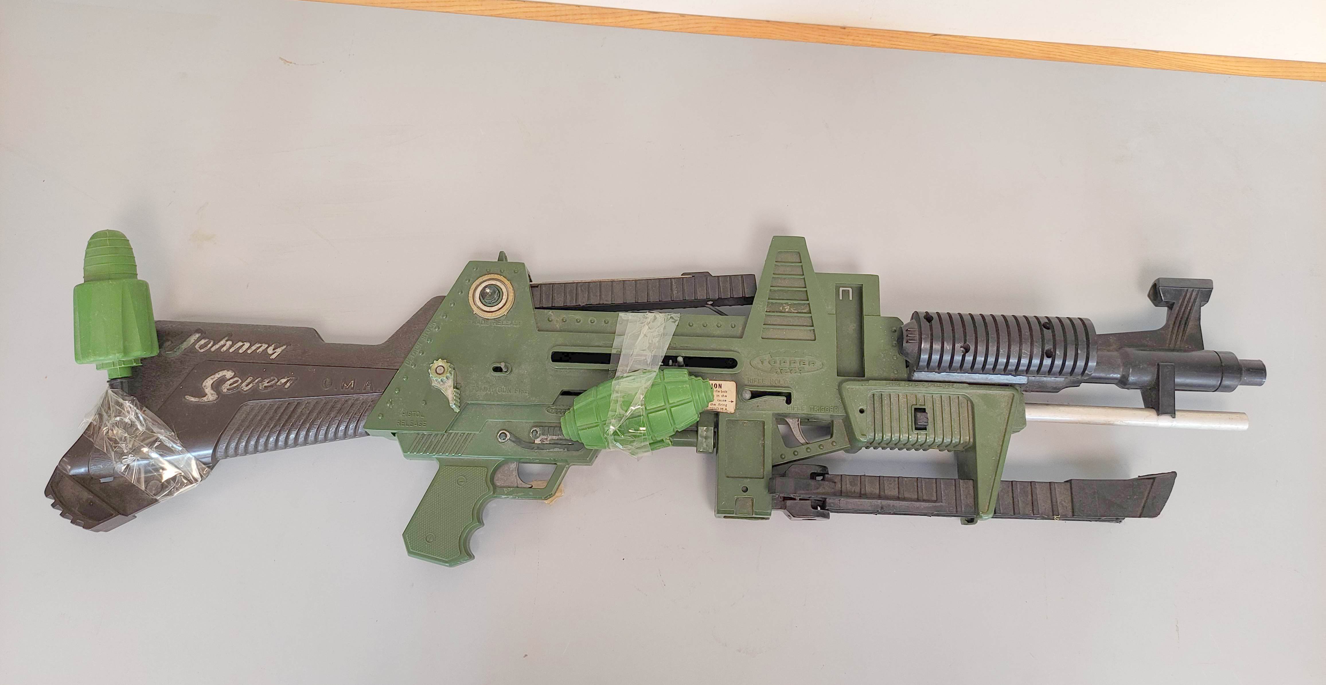 Topper Toys- Johnny Seven O.M.A One Man Army combat rifle of green plastic construction with bi- - Image 4 of 6