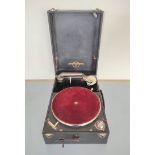 1920s Columbia no 201 portable gramophone in hard leatherette carry case. Lacking bakelite handle