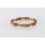 9ct gold amethyst and peridot set lady's bracelet, 17cm long, 14.3g.