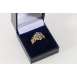 18ct yellow gold diamond cluster flowerhead ring, size O, 6.9g.