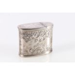 Antique white metal table snuff box of oval form, with foliate scrolling decoration, no marks, 6.5cm