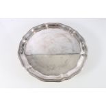 Sterling silver salver on tripod supports, with wavy edged rim, marks badly rubbed, Elkington & Co.,
