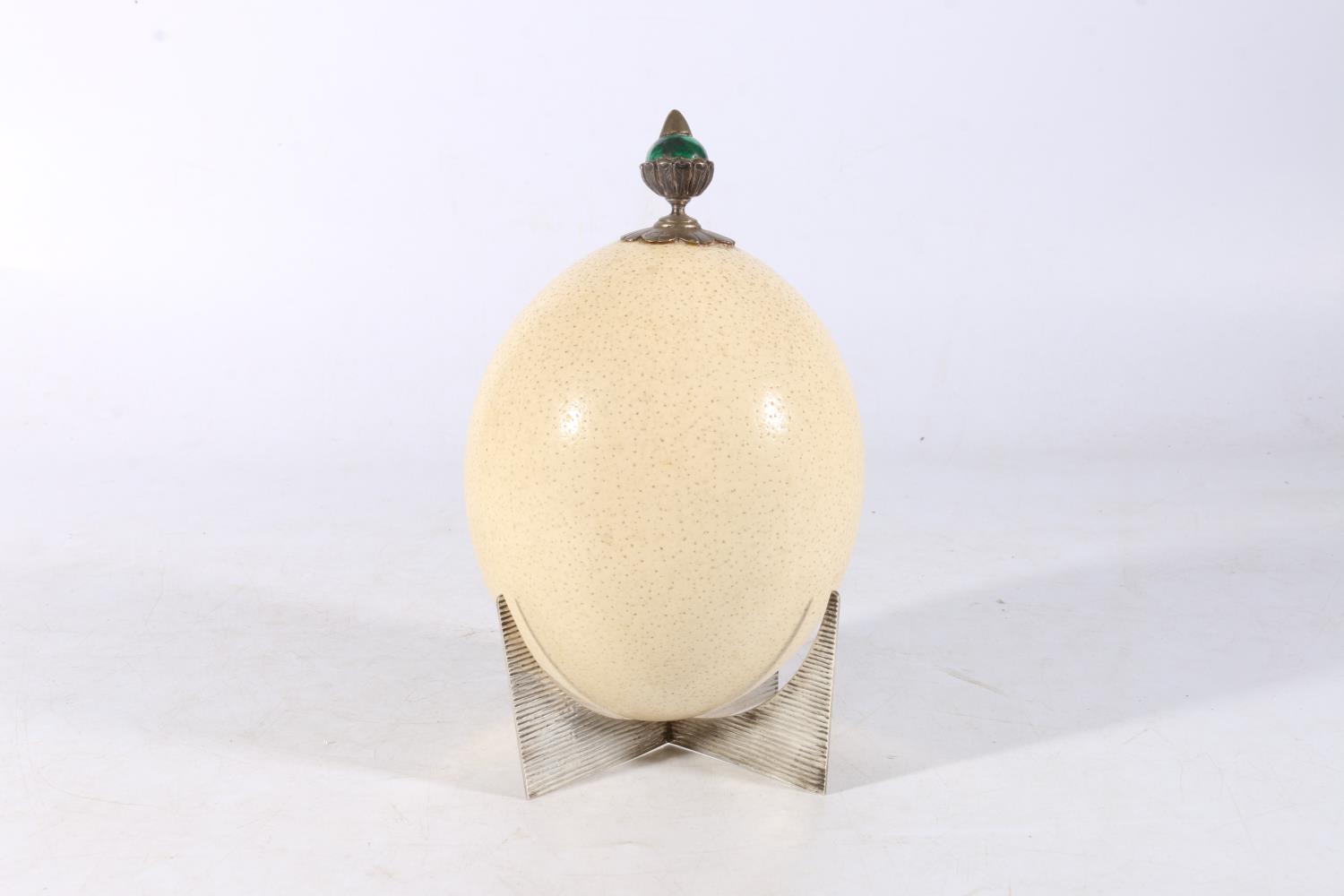 Sterling silver and malachite mounted ostrich egg, on silver stand, 19cm high.