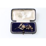 9ct gold lily-of-the-valley style seed pearl spray brooch, 3.8g in James Weir Ltd leather box.