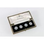 18ct gold sapphire and mother-of-pearl set four stud set, in Brook & Son of Edinburgh box, 4g.