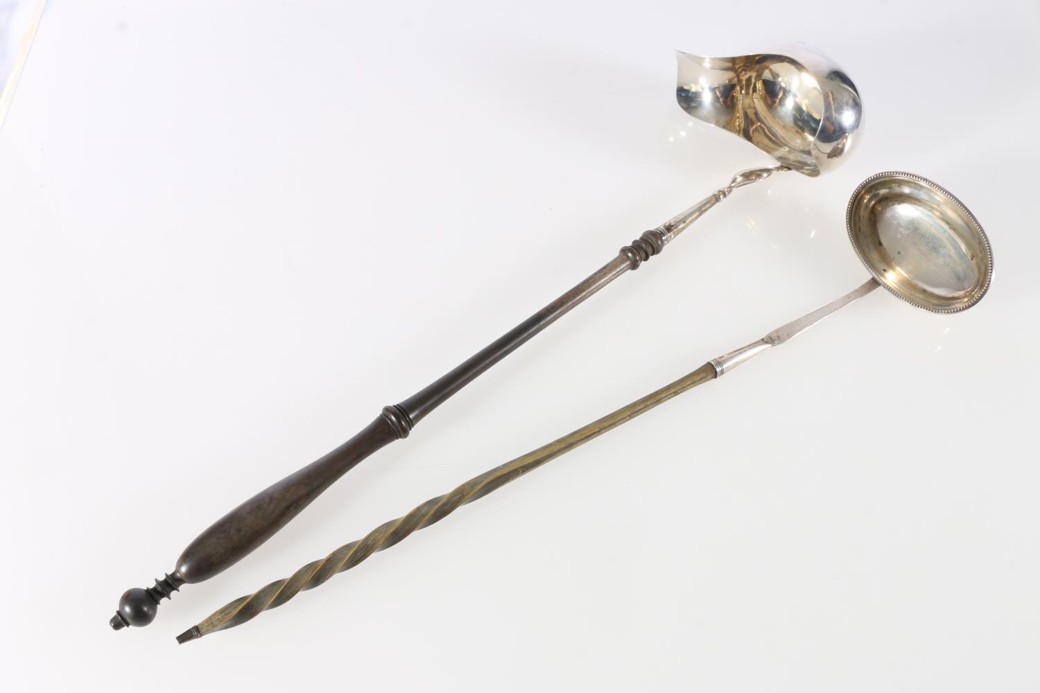 Two antique silver toddy ladles, with baleen handles, makers B B & I A? one with pouring spout.