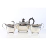 Edwardian sterling silver three piece teaset of plain form  on ball supports, R & W Sorley, Glasgow,