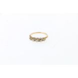 Unhallmarked gold five stone diamond ring, size J, 2.2g.