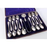 Cased set of twelve sterling silver teaspoons, with matching tongs, a caddy spoon and  sugar