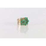 14K gold stamped green stone set ring constructed of five articulated bands, size M/N, 9g.
