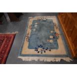 Chinese-style rug on a blue ground.