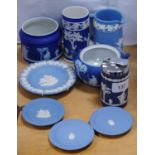 Collection of Wedgwood blue Jasper ware to include spill vase, sugar bowl, pin dishes, lighter etc.