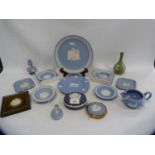 Group of Wedgwood blue Jasper ware to include plates, scent bottle, trinket jars and covers, also