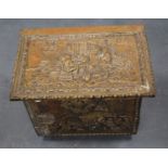 Brass log box with a panel to the top depicting a tavern scene.