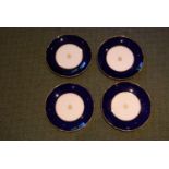 Set of four Minton porcelain cabinet plates