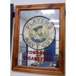 Advertising mirror for Player's Navy Cut Tobacco and Cigarettes.