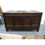 19th century carved oak coffer with floral decoration.